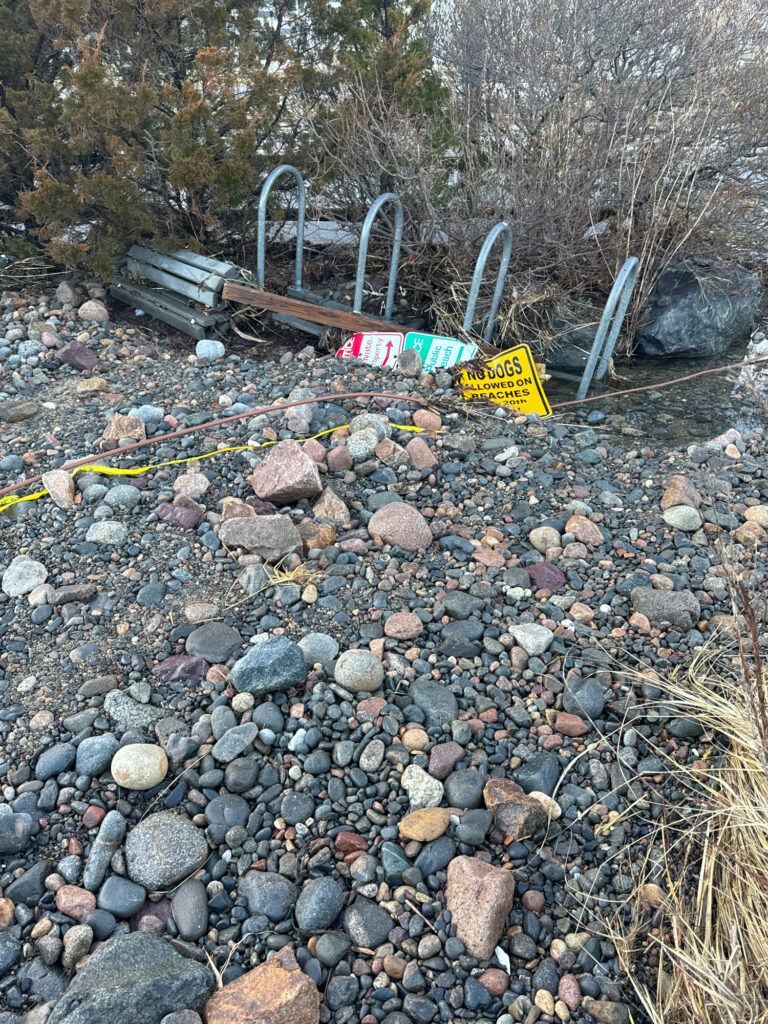 a sign on a rocky area (MyCoast AI)