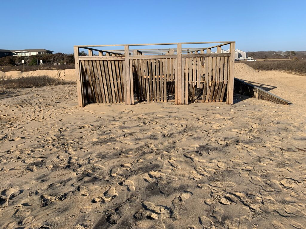 a wooden structure in a sandy area (MyCoast AI)