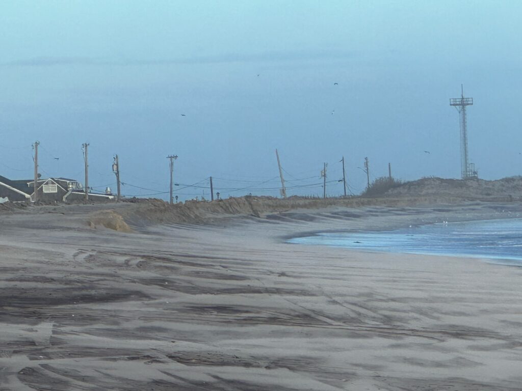 a beach with power lines (MyCoast AI)