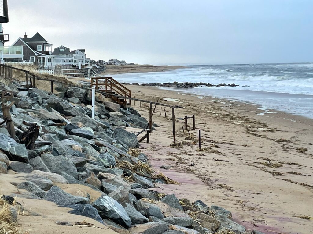 a rocky beach with a wooden walkway (MyCoast AI)