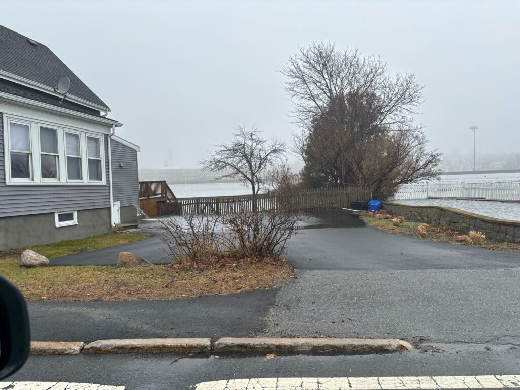 a road with houses along it (MyCoast AI)