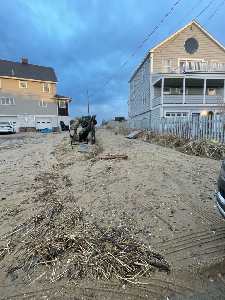 a pile of dirt in front of a house (MyCoast AI)
