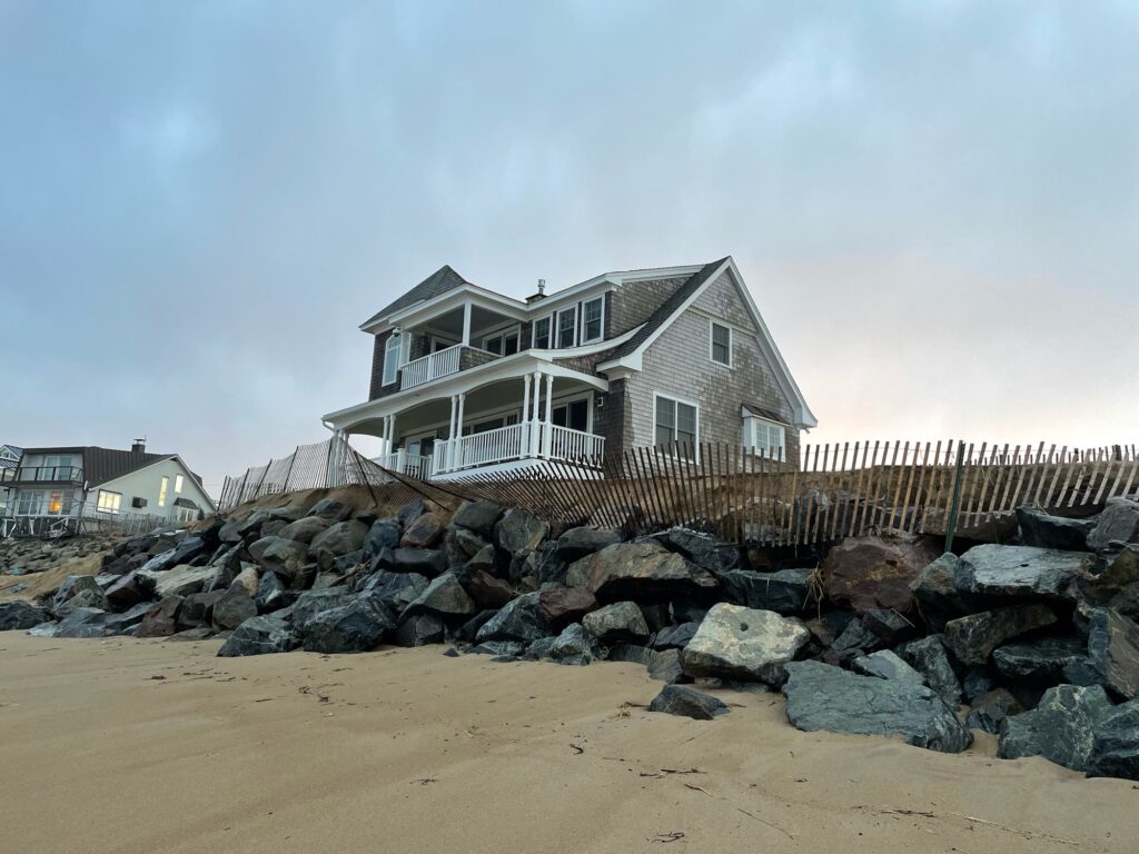 a house on a rocky beach (MyCoast AI)