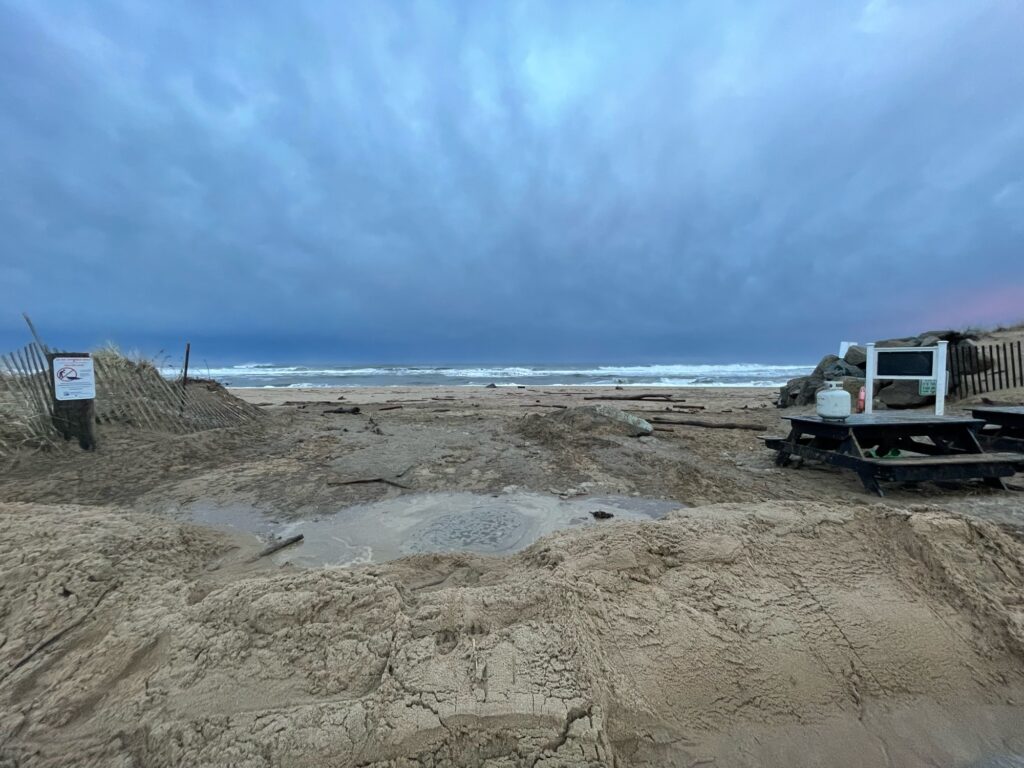 a truck parked on a beach (MyCoast AI)