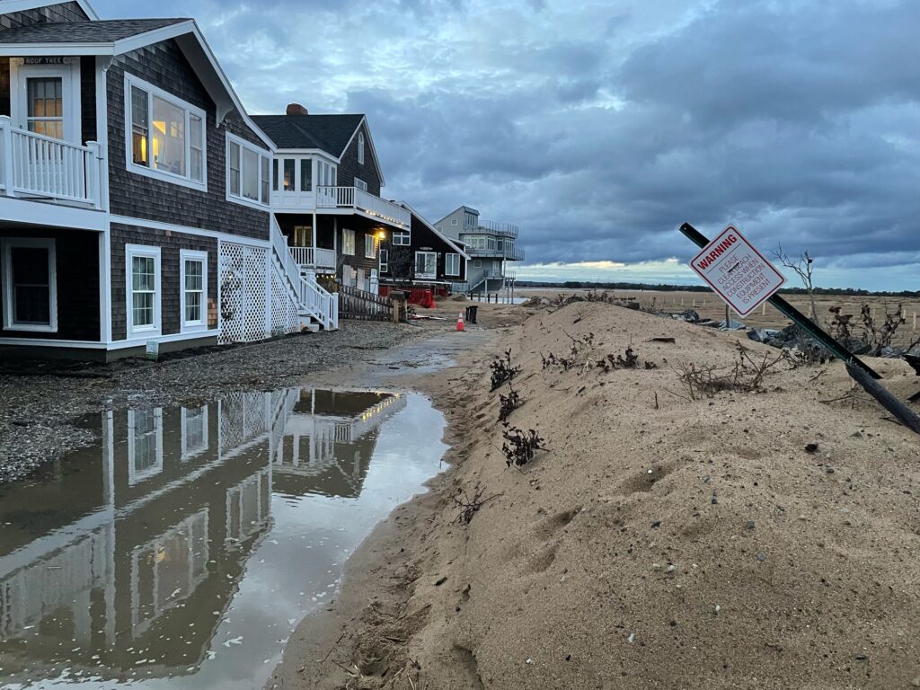 a row of houses on a beach (MyCoast AI)