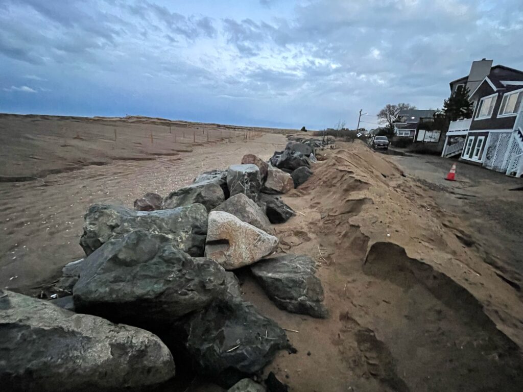 a pile of rocks on a dirt road (MyCoast AI)