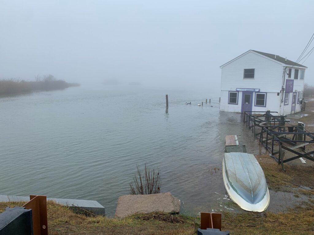 a house on a dock by the water (MyCoast AI)