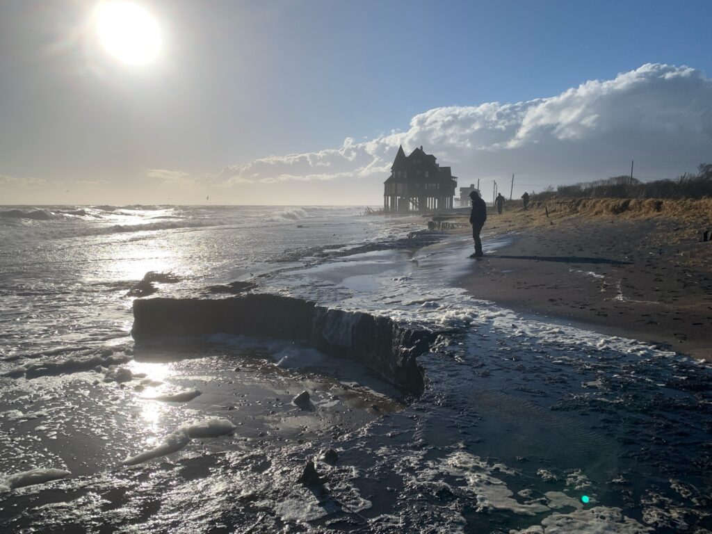 a person walking on a beach (MyCoast AI)