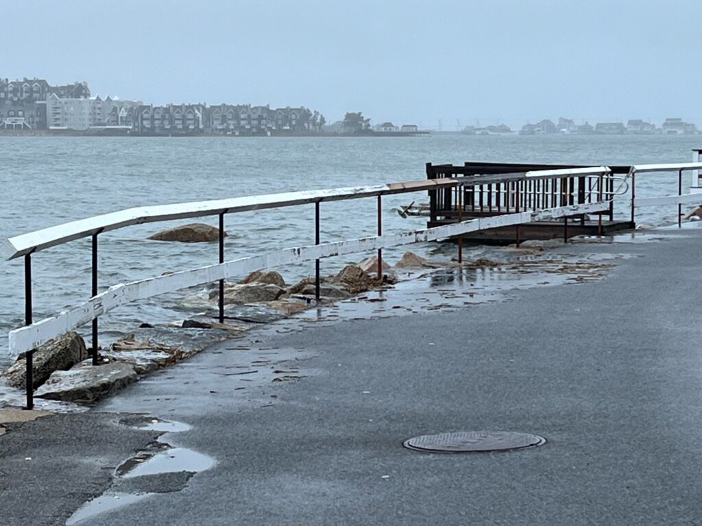 a bench on a pier (MyCoast AI)