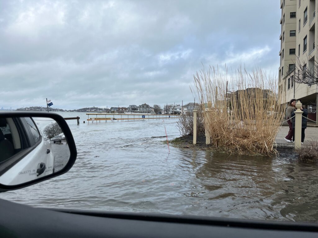 a car driving through a flooded street (MyCoast AI)