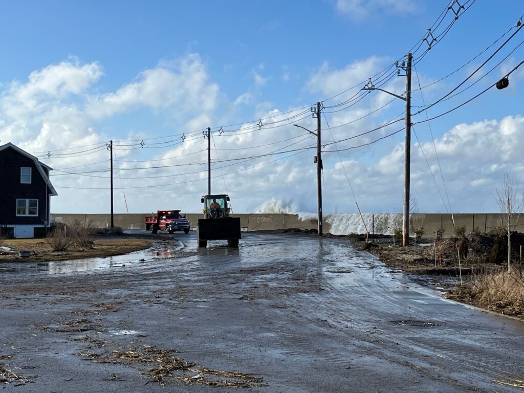 a flooded road with power lines (MyCoast AI)