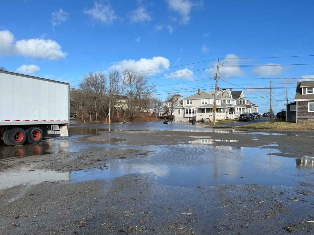 a truck parked in a flooded street (MyCoast AI)