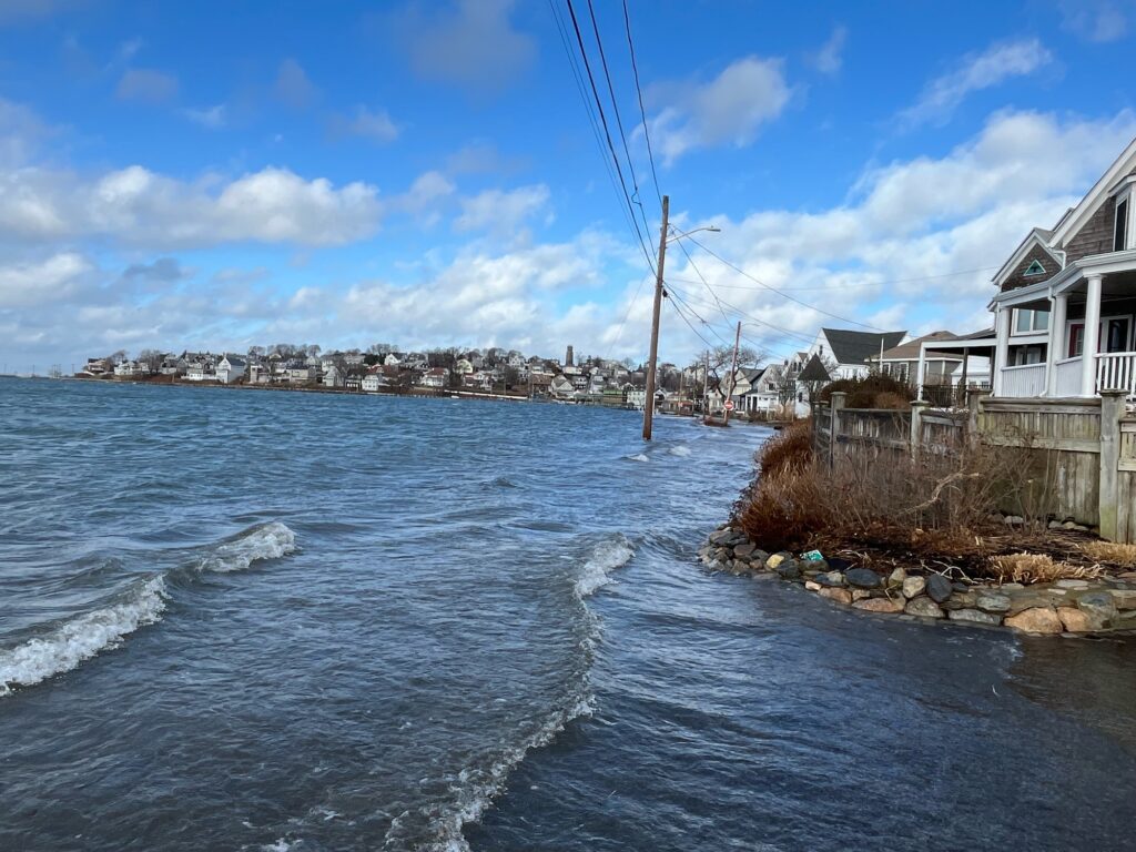 a body of water with houses along it (MyCoast AI)