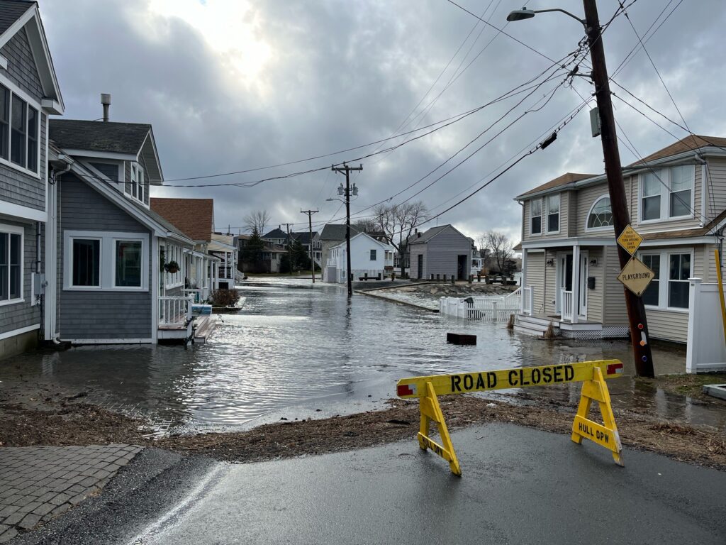 a flooded street with houses (MyCoast AI)