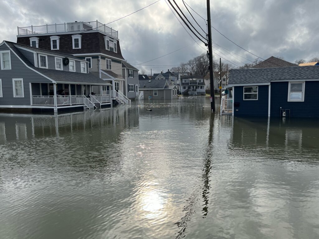 a row of houses on a flooded street (MyCoast AI)