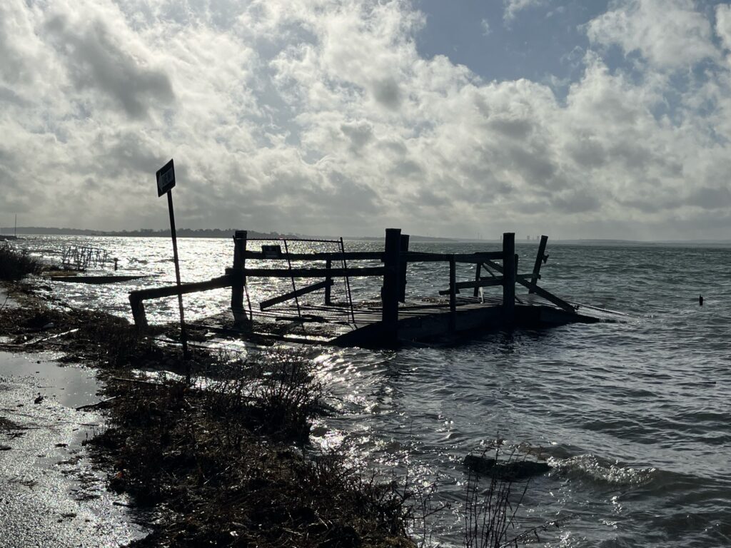 a wooden dock in the water (MyCoast AI)