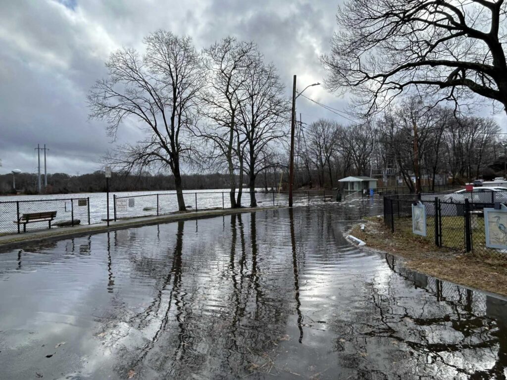 a flooded area with benches and trees (MyCoast AI)