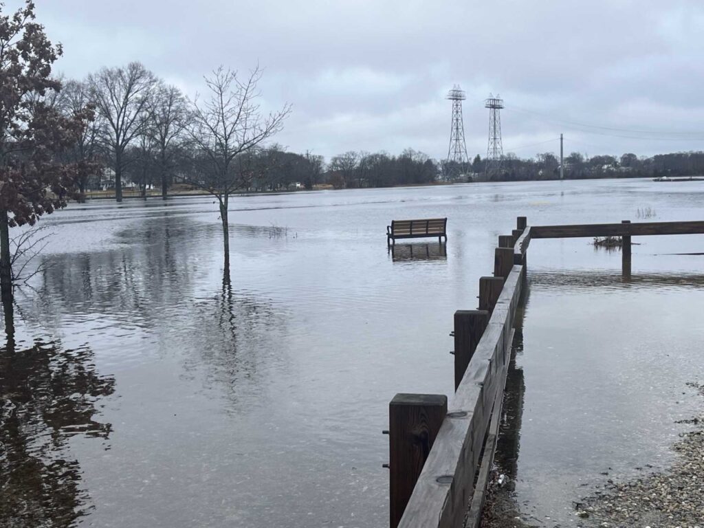 a flooded area with a bench (MyCoast AI)