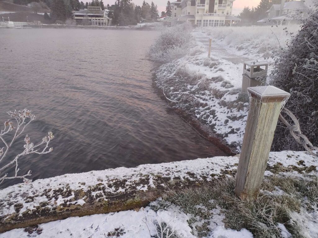 a river with snow on the banks (MyCoast AI)