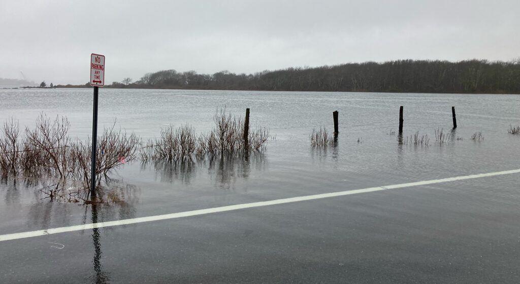 a lake with a sign in the middle (MyCoast AI)