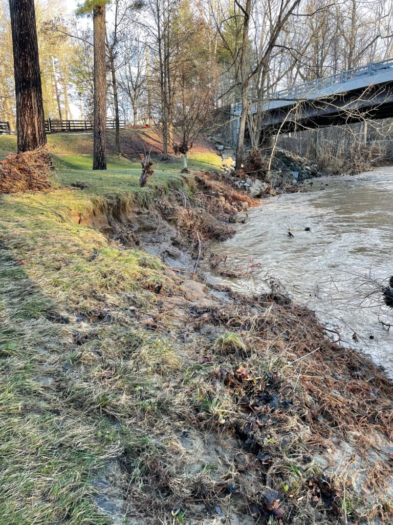 a river with a bridge over it (MyCoast AI)