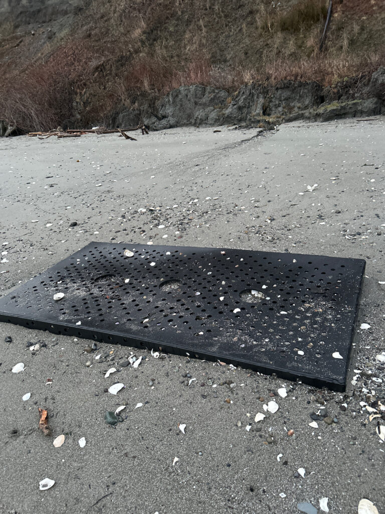a black rectangular object on a road (MyCoast AI)