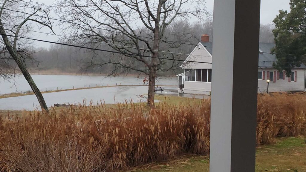 a house with a lake in the background (MyCoast AI)
