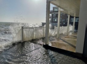 a building with a large body of water in the front (MyCoast AI)