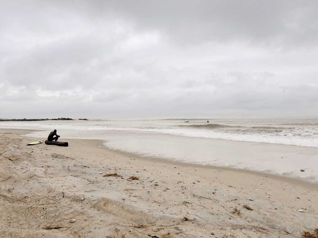 a person sitting on a beach (MyCoast AI)