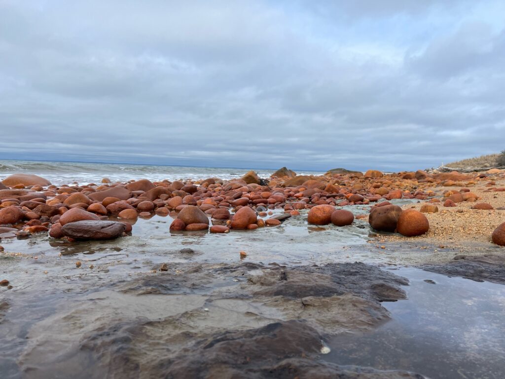 a group of rocks on a beach (MyCoast AI)