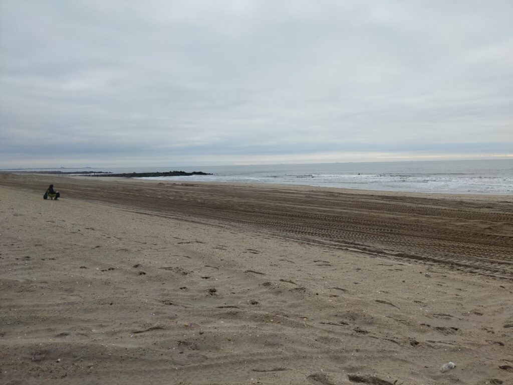 a person sitting on a beach (MyCoast AI)