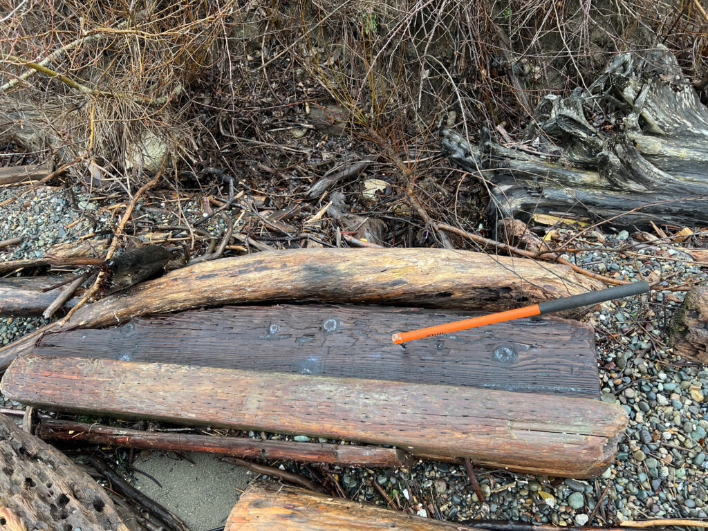 a wooden bench with a stick in it (MyCoast AI)