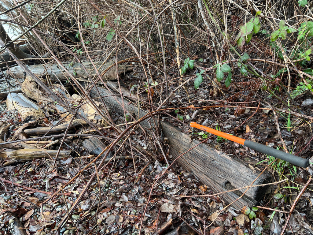 a rifle lying on the ground (MyCoast AI)