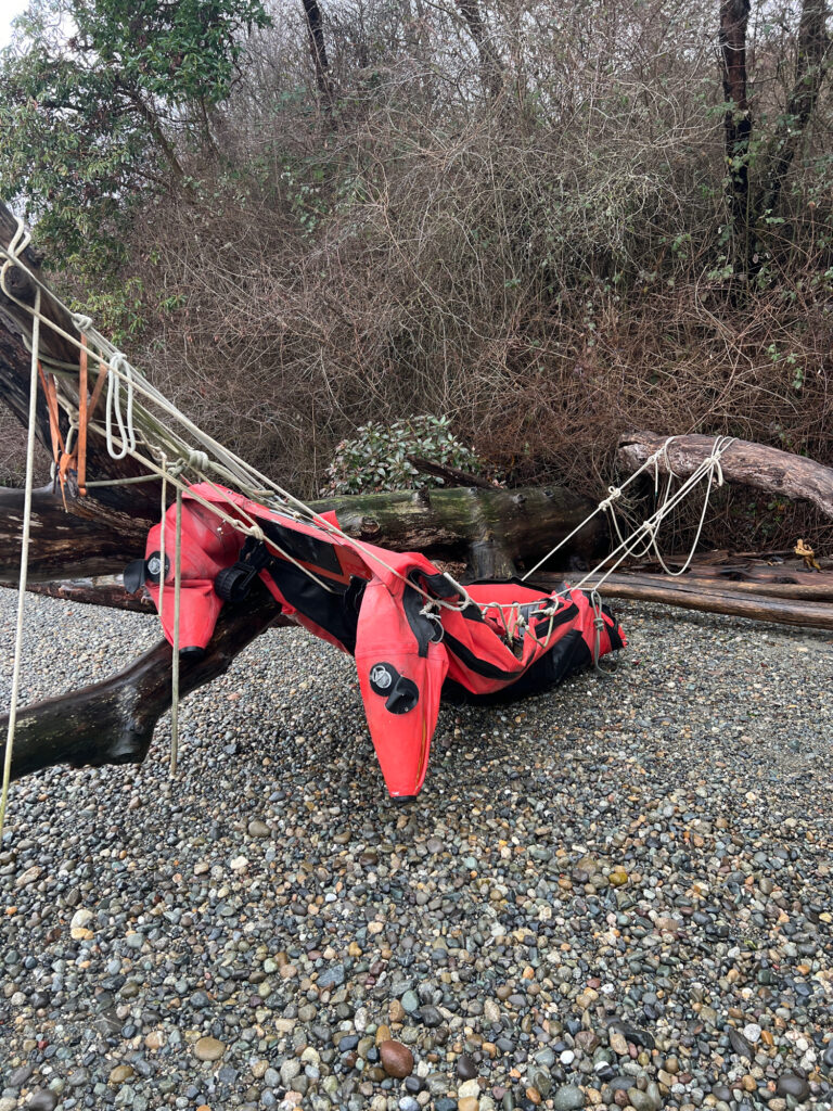a red and black swing glider (MyCoast AI)