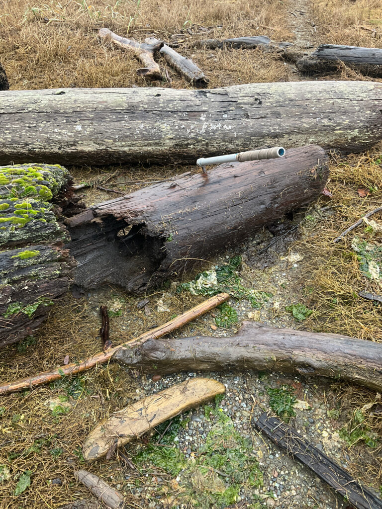 a wood fence with a gun on it (MyCoast AI)