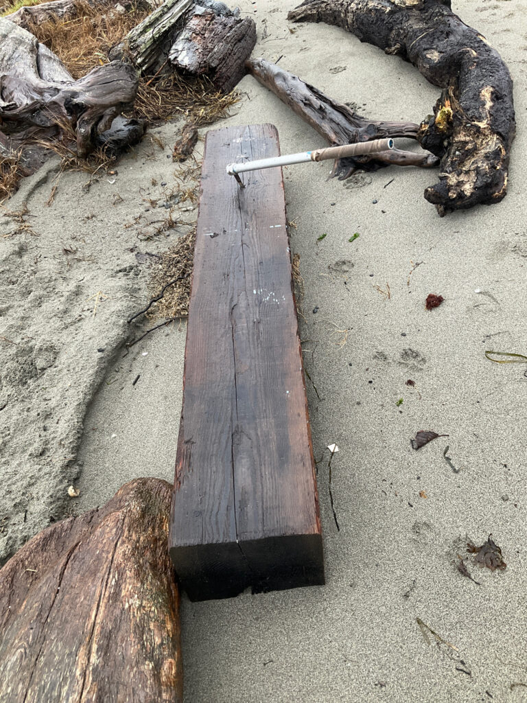 a wooden board on the ground (MyCoast AI)