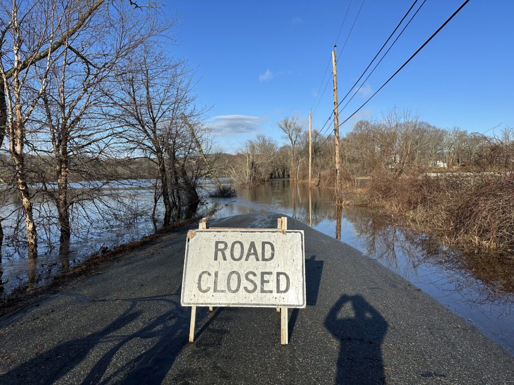 a sign on the side of a road (MyCoast AI)