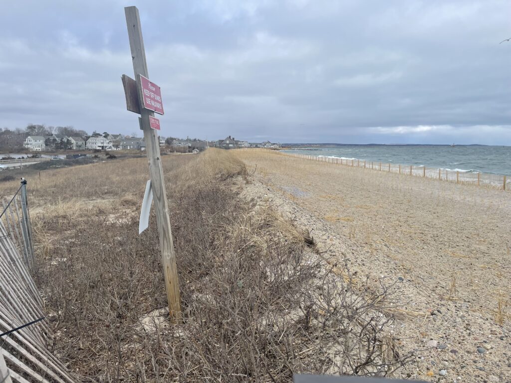 a beach with a sign (MyCoast AI)