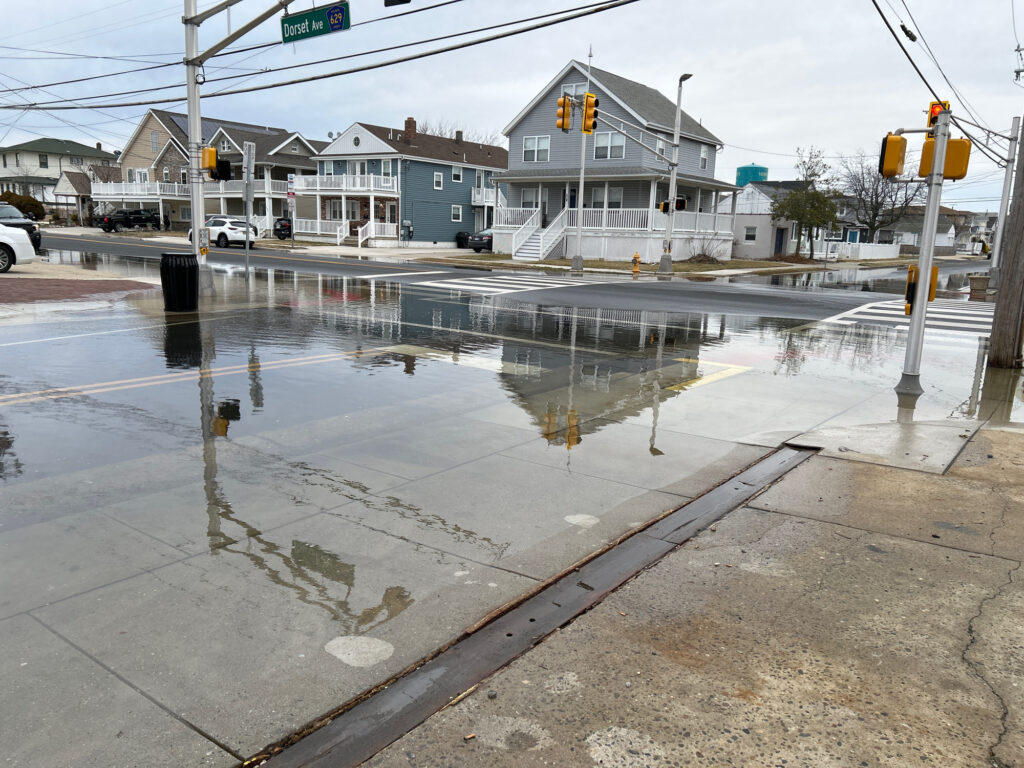 a flooded street with houses (MyCoast AI)