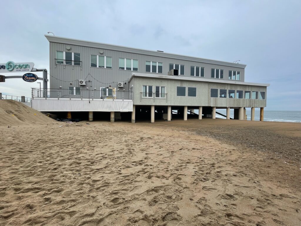 a building on a beach (MyCoast AI)