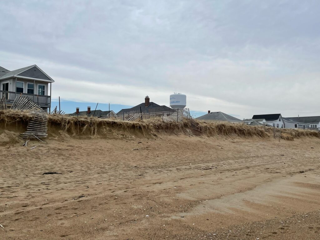 a sandy area with buildings in the background (MyCoast AI)