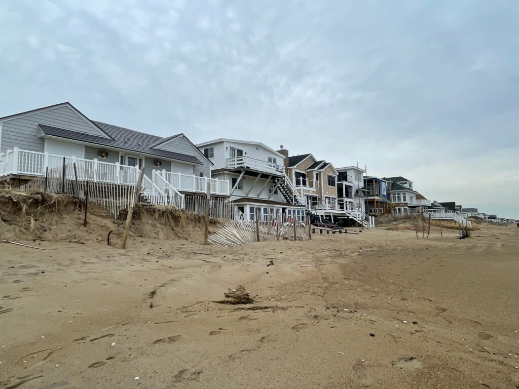 a group of houses on a beach (MyCoast AI)