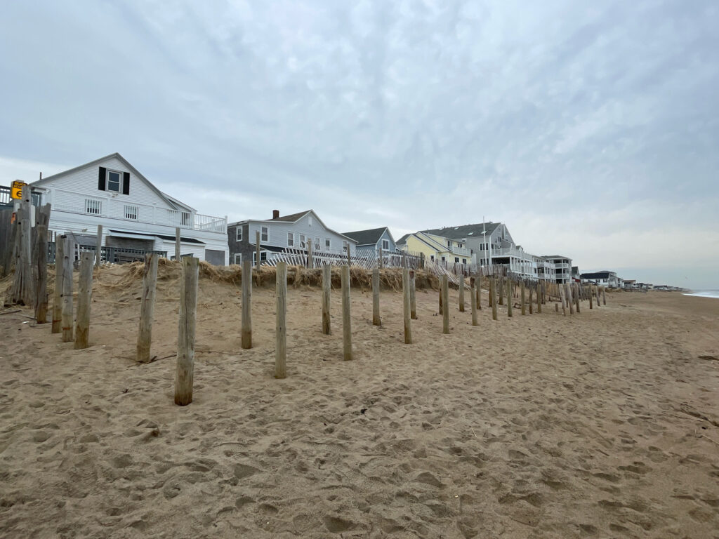 a row of houses on a beach (MyCoast AI)