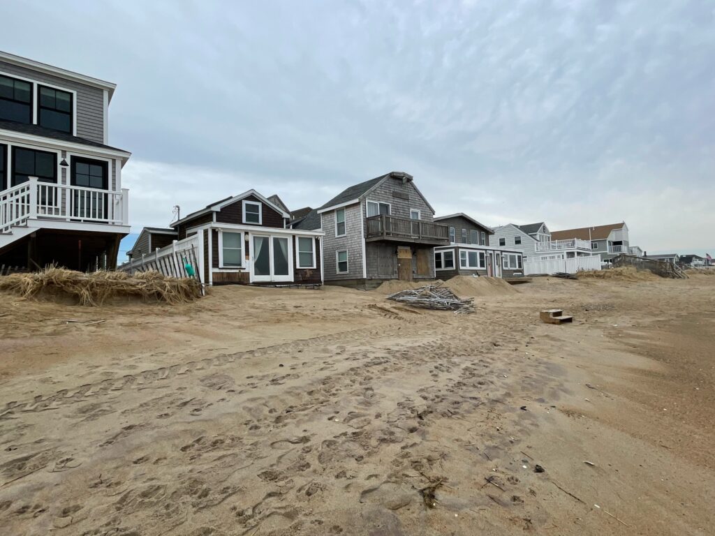 a row of houses on a beach (MyCoast AI)