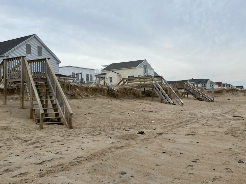 a group of houses on a beach (MyCoast AI)