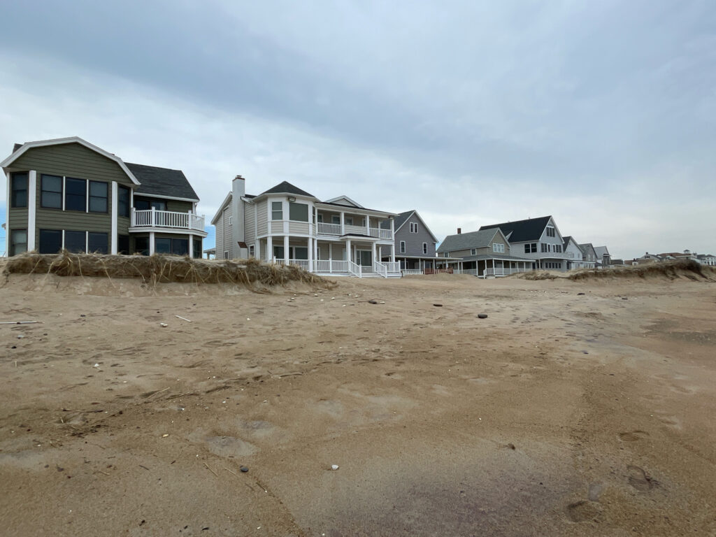 a row of houses on a beach (MyCoast AI)