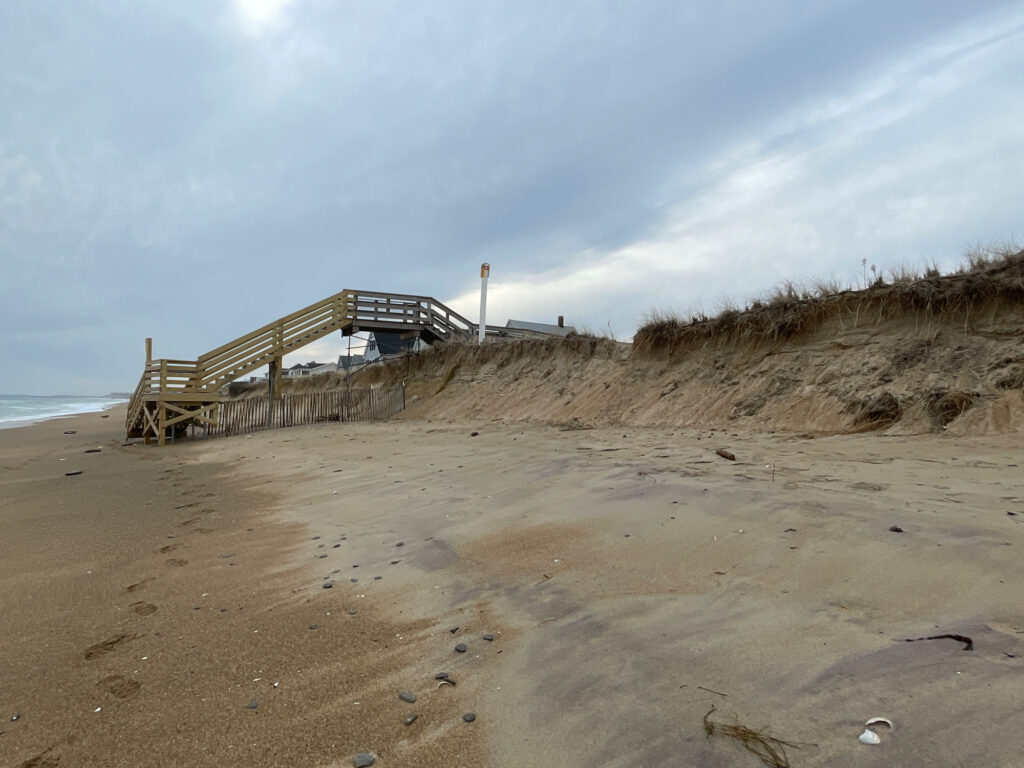 a wooden bridge over a beach (MyCoast AI)