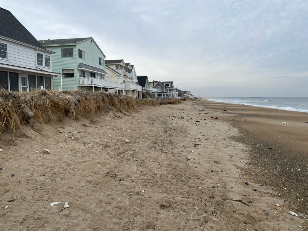 a beach with houses along it (MyCoast AI)