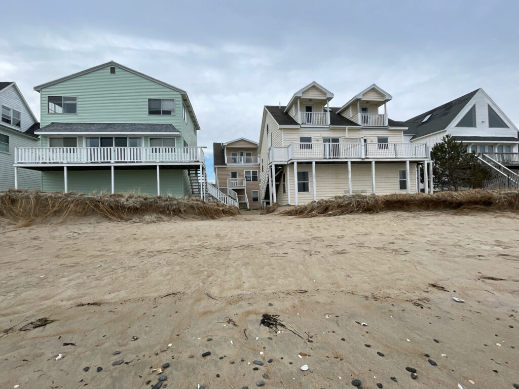 a row of houses on a beach (MyCoast AI)
