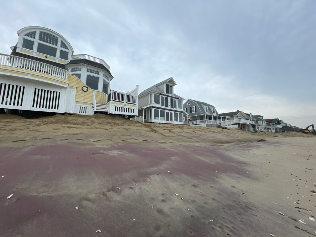 a row of houses on a beach (MyCoast AI)